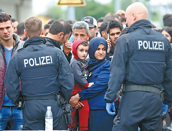 Ministers bid to disperse refugee influx