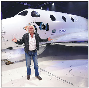 Virgin Galactic rolls out new space tourism rocket plane