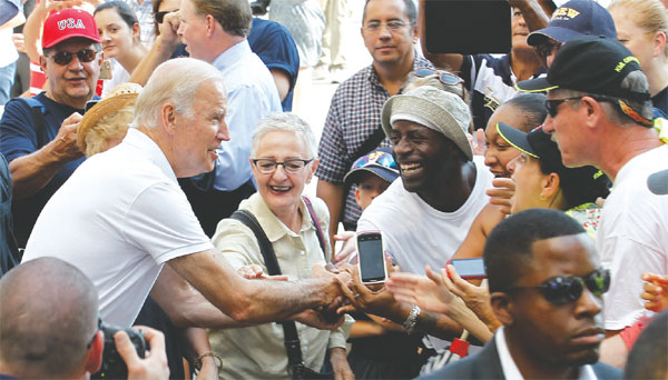 At Pittsburgh parade, Biden calls for fix to income inequality