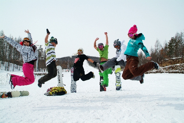 Tourists enjoy snow and ice