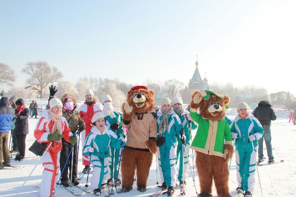 Tourists enjoy snow and ice