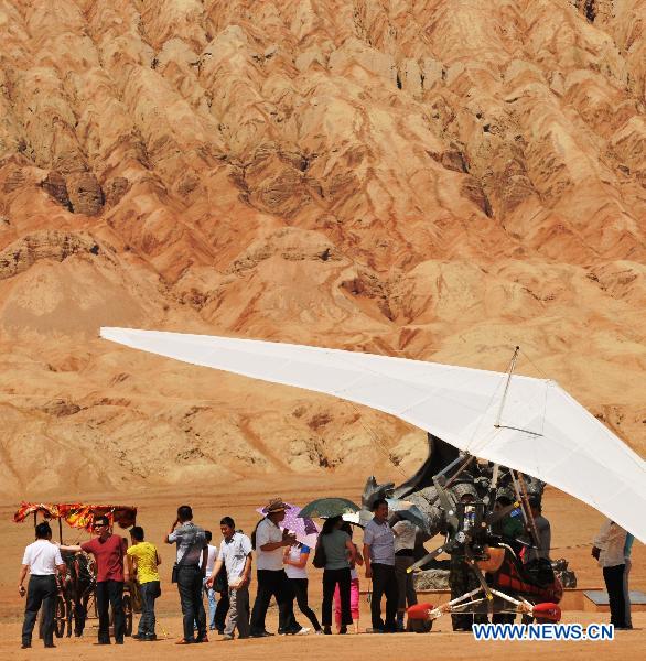 Tourists visit Flaming Mountain in Xinjiang