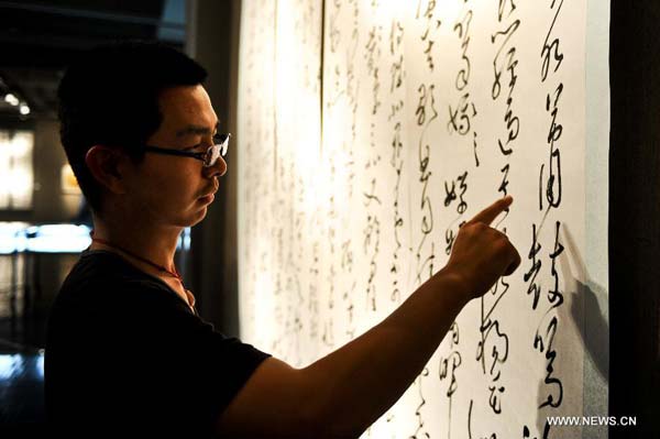 Chinese calligrapher Deng holds exhibit in NE China