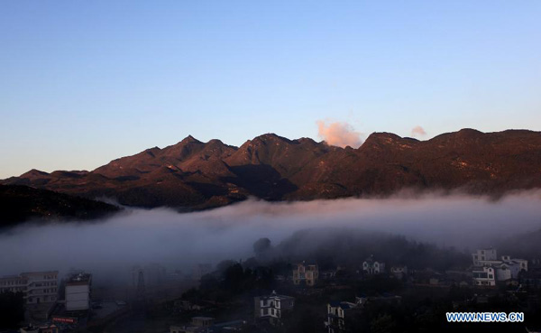 Cloud-blanketed Luoping county in SW China's Yunnan