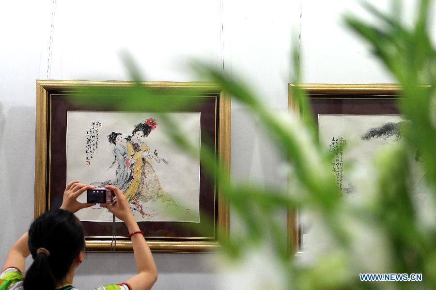 Famed artist's paintings exhibited in Beijing