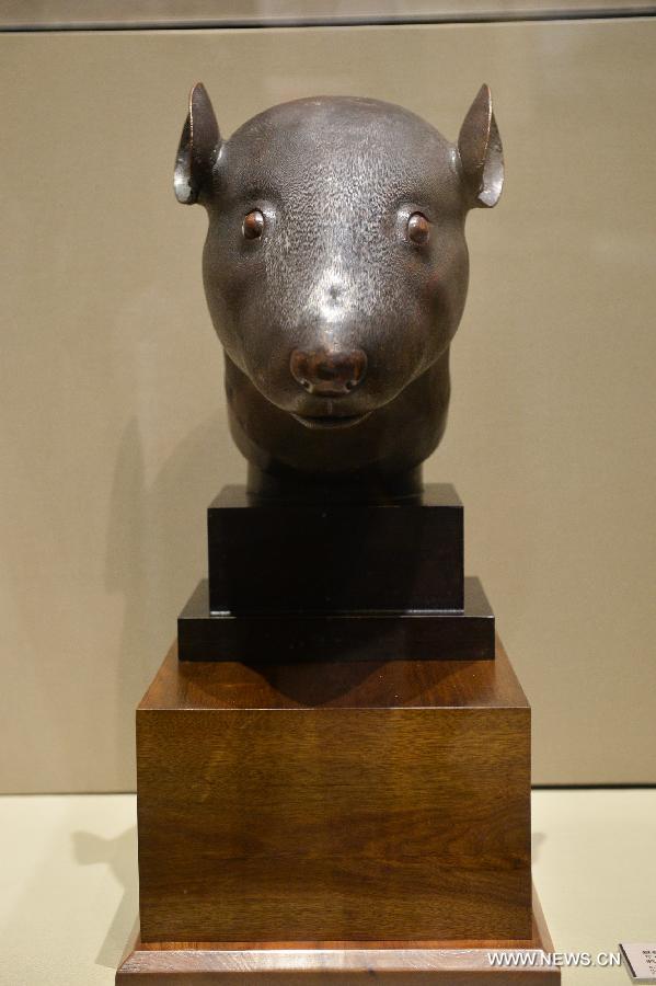 Rat, rabbit head sculptures on display