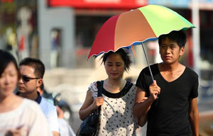 Making umbrellas manly is simple: Cast a chivalrous shadow