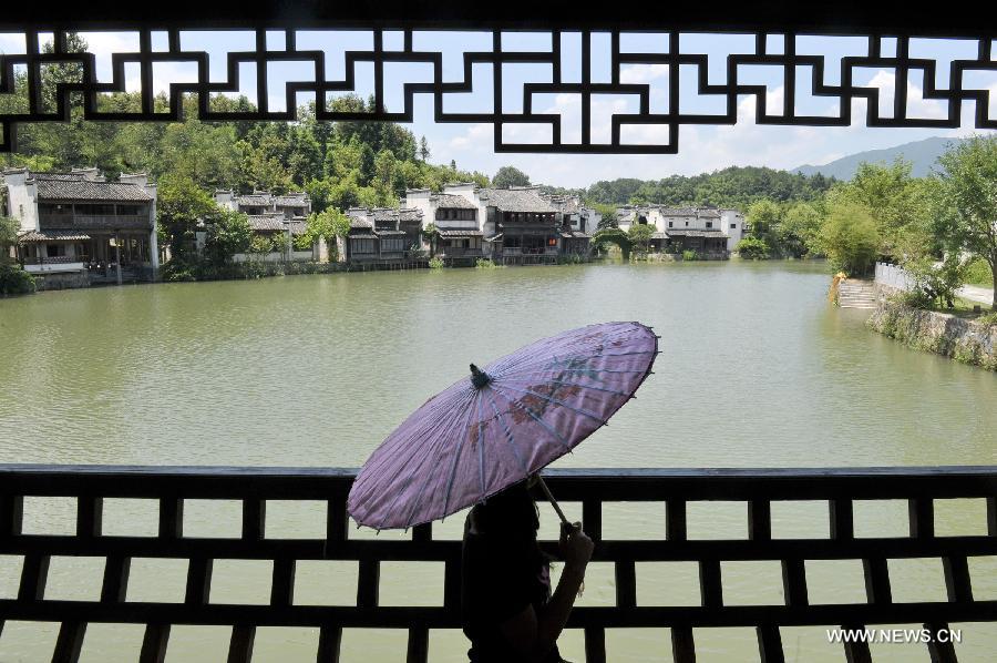 Ancient buildings rebuilt in E China village