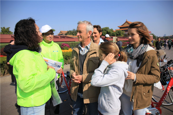 Beijing cycling tour promotes China Daily