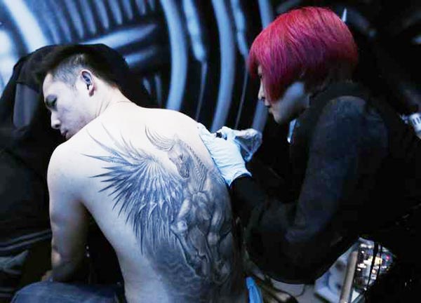 In China, tattoos starting to stick