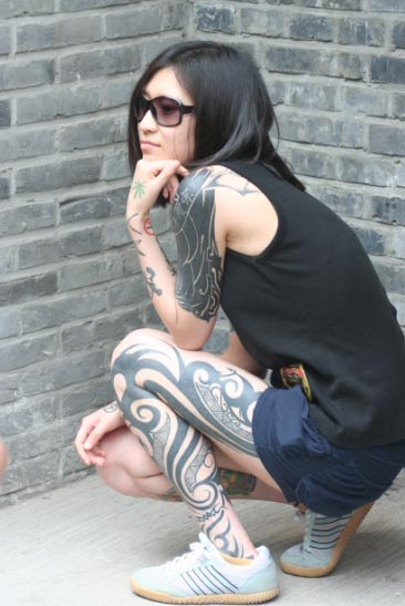 In China, tattoos starting to stick