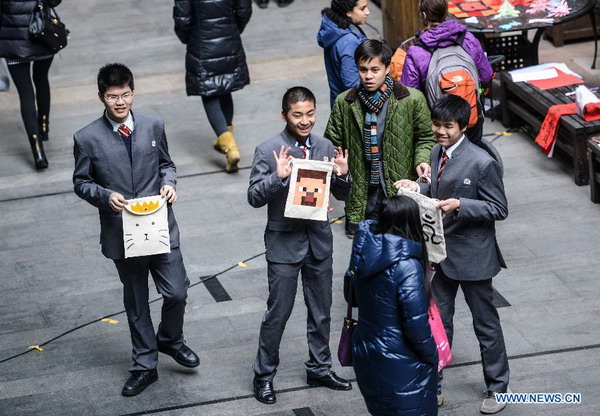 More than 60 int'l students participate in charity bazaar in Hangzhou