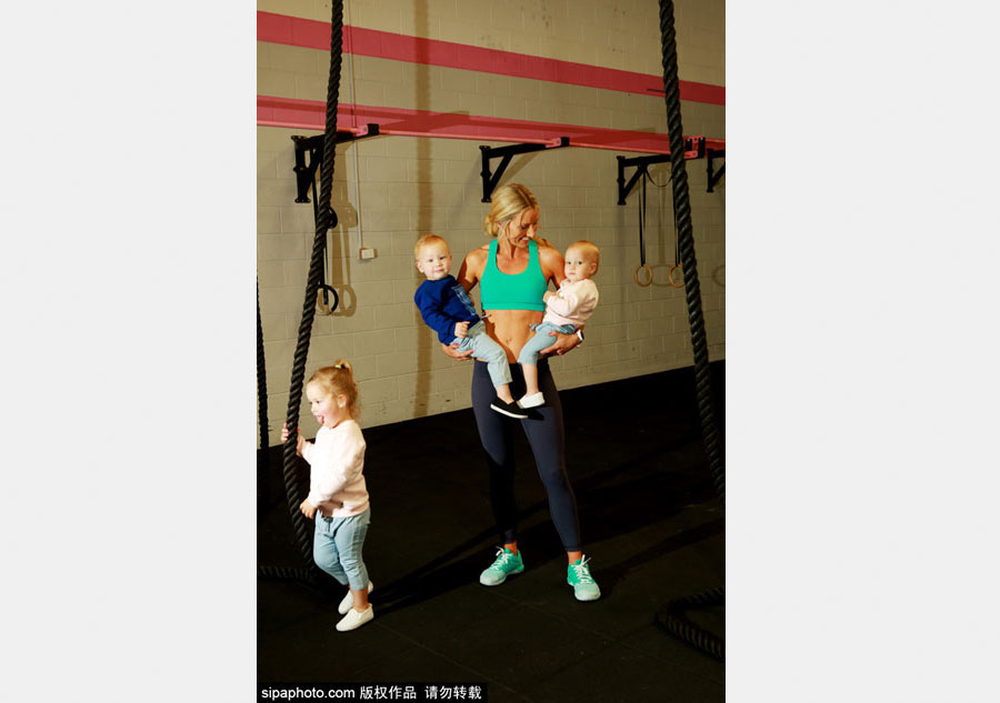 Super fit mother works out with her three children