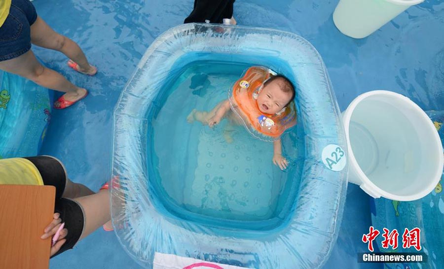 Babies in swimming contest