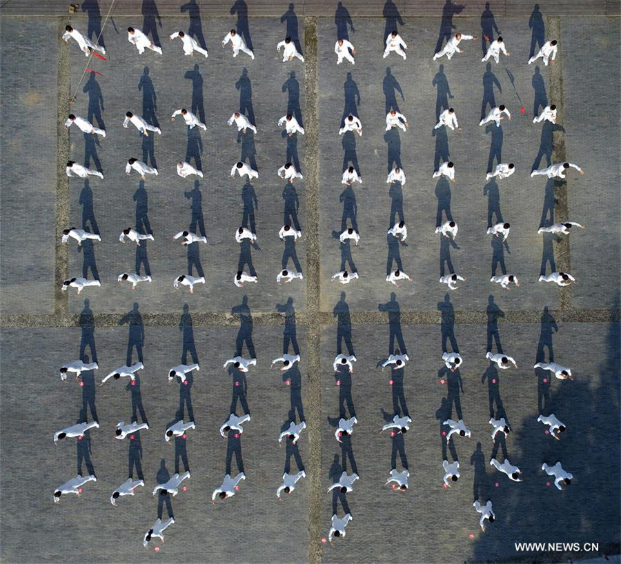 Tai chi fans practise in Hongze, East China's Jiangsu