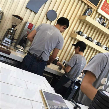 Leah Dou serves coffee in Beijing