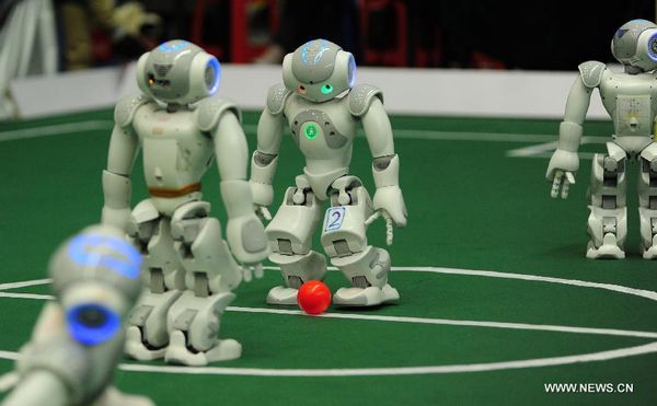 Robots kick off soccer match in E China