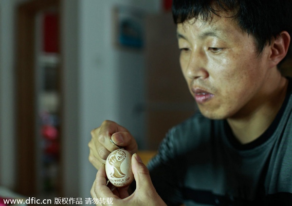 Carving a World Cup on an egg