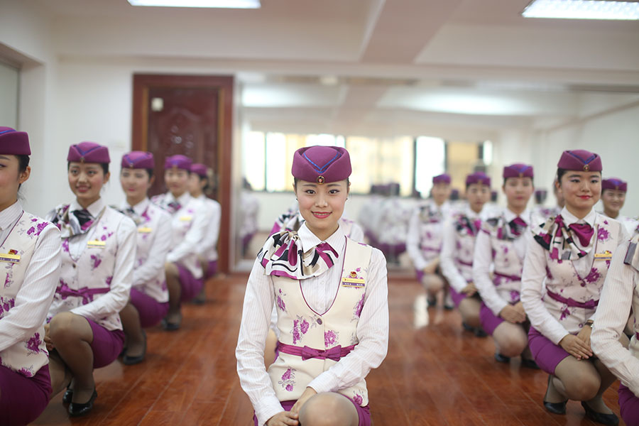 Stewardesses trained to show sweet smile