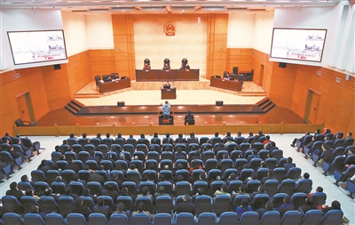 Officials sit in on trial