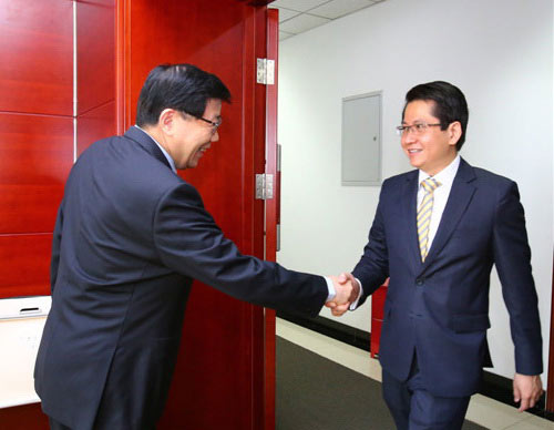 President Li Wei meets with Singapore's ambassador to China Mr. Stanley Loh Ka Leung