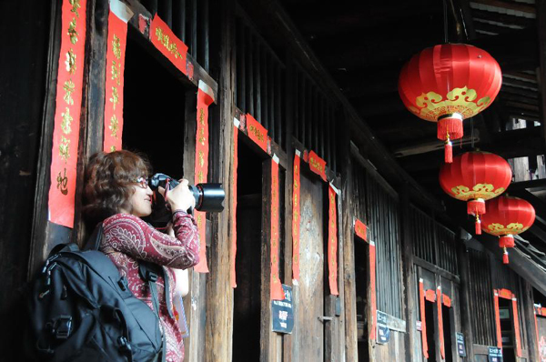 Tourists visit Tulous in Yongding, China's Fujian