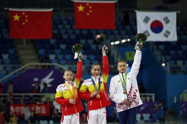 Fuzhou's Yao claims gold medal hat-trick at Asian Games