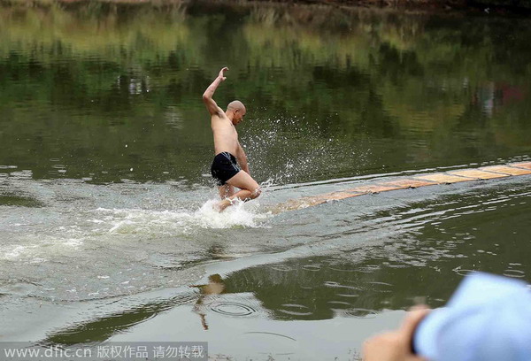 Shaolin monk makes a splash with water walk