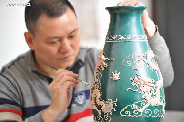 Lacquer thread sculpting honored as intangible heritage