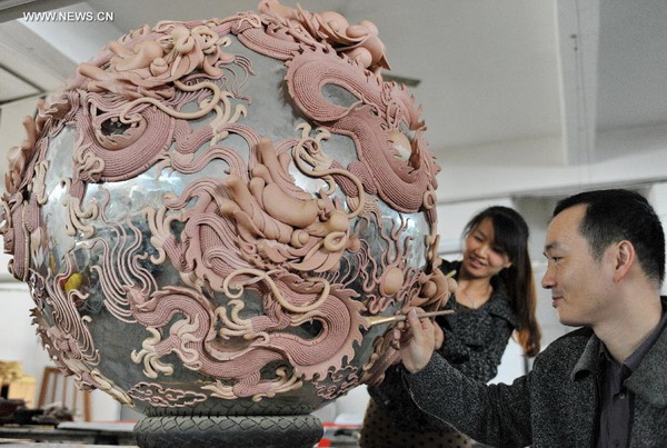 Lacquer thread sculpting honored as intangible heritage