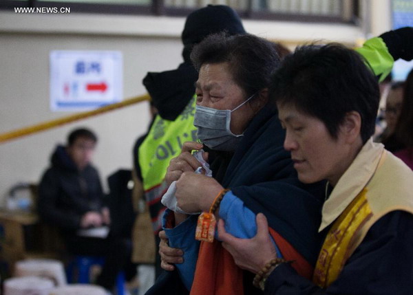 People mourn plane crash victims in Taipei