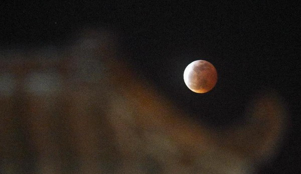 Short lunar eclipse offers a blood red moon