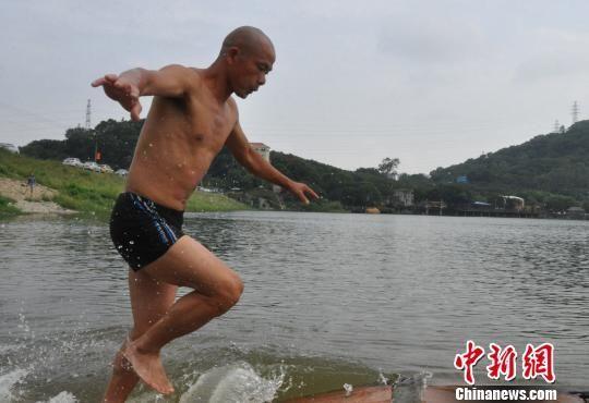 Monk walks on water for a cause