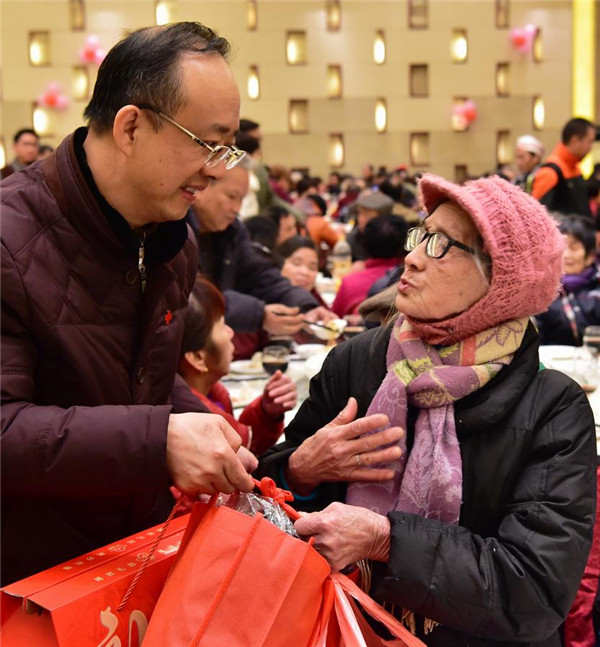 Chinese New Year's Eve dinner for poor families in Fuzhou