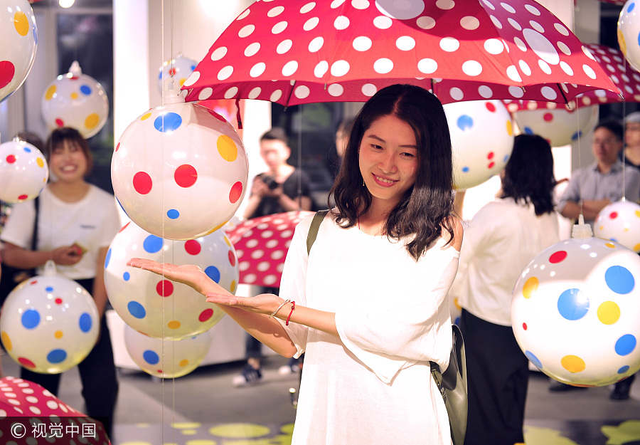 Japanese artist Kusama displays her polka dot artworks in Fuzhou