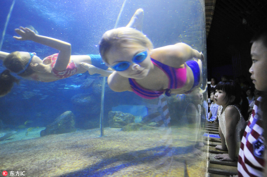 Russian underwater performers' Chinese dream