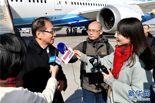 Fujian CPPCC members arrive in Beijing