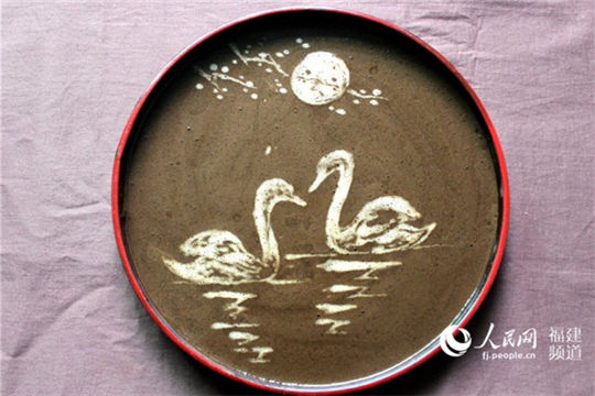 Artists rejuvenates ancient tea art