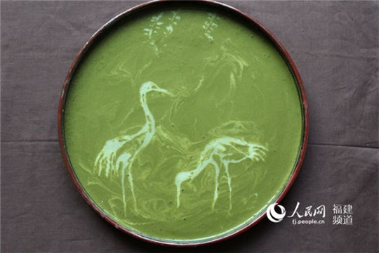 Artists rejuvenates ancient tea art