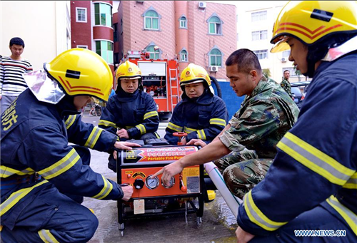 Jinjiang funds to set up 100 volunteer firefighter squads