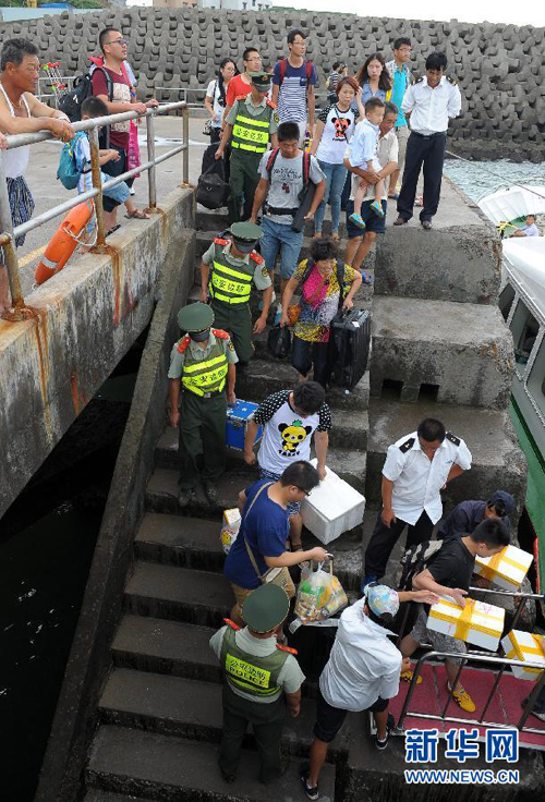 Alert remains for Typhoon Goni