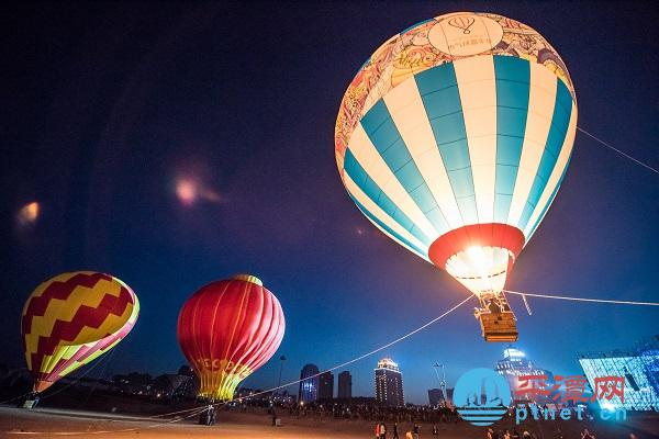 Hot air balloons crowd the skies over Pingtan