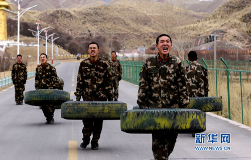 Popeye-like soldiers practice with tires