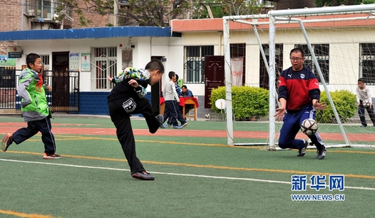 Gym teachers say bonjour to Gansu after returning from French football camp