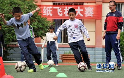 Gym teachers say bonjour to Gansu after returning from French football camp