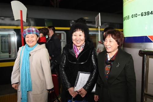 CPPCC members arrive in Beijing for annual session