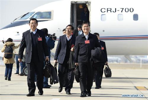 CPPCC members arrive in Beijing for annual session