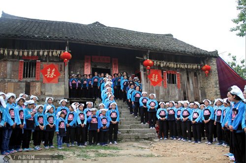 Tian'e holds fourth tung flower festival