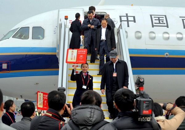 Deputies to 12th NPC arrive in Beijing