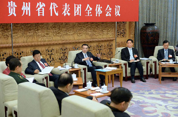 China's top leaders join discussion with deputies to 12th NPC